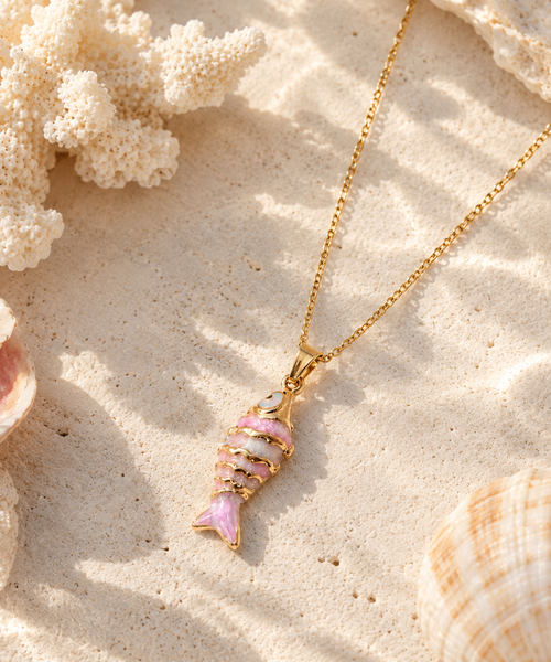 Pink fish pendant necklace with gold-tone detailing